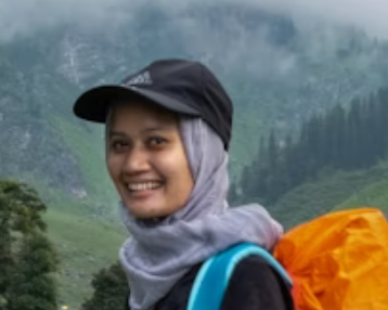 Smiling hiker with backpack